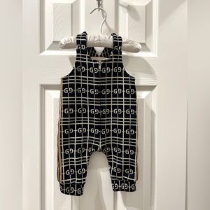 6/9m Gucci logo overalls. Stretch knit jogger style ankle cinching.